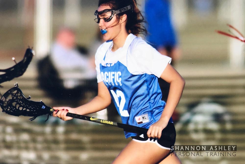 Woman playing fielf hockey