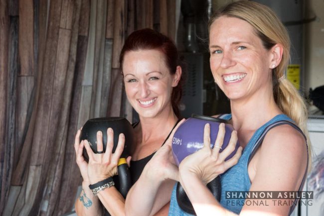 Shannon and a client doing goblet squats